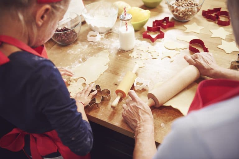 A family makes cookies together during the holidays.