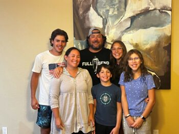 Gabrielle, age 13, (pictured far right) with her family today, over one decade after receiving her first transplant at Seattle Children's Heart Center