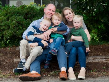 a family poses for a family portrait