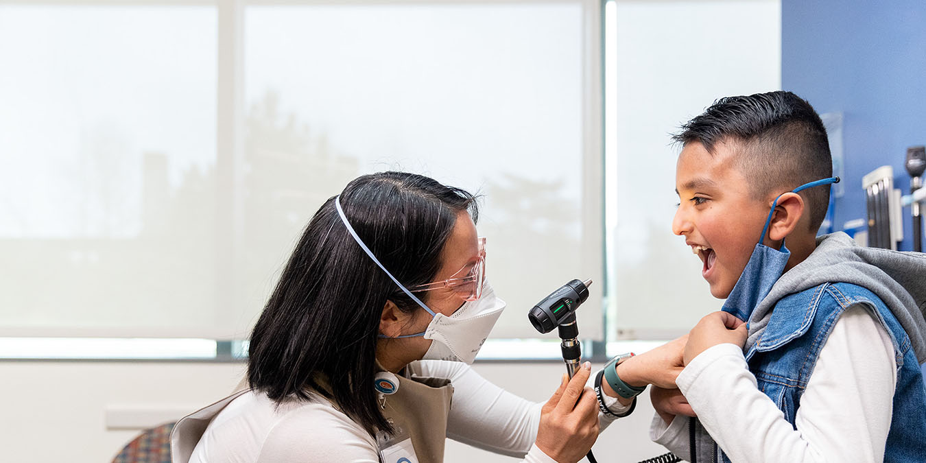 A young patient speaks to a doctor.