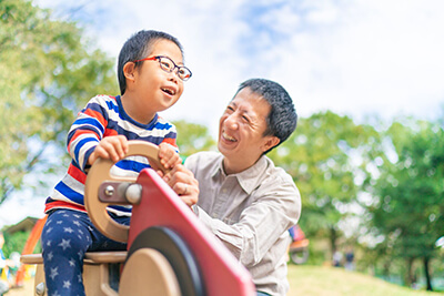 Father and son at playground