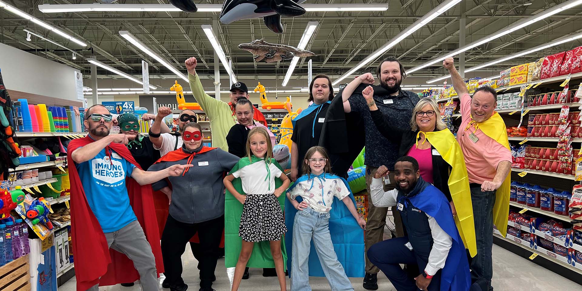 Employees pose for a picture in a store