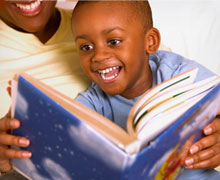 Kiddo and mom reading a book