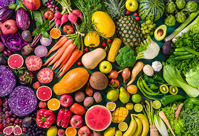 A variety of fresh produce cut and displayed