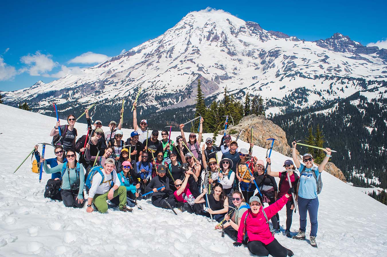 Residents pose for the camera on a mountain