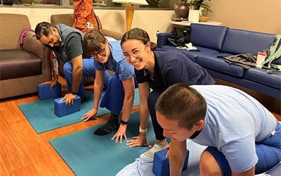 Residents practicing yoga