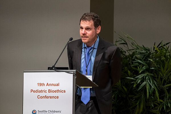 Dr. Aaron Wightman gives opening remarks at the 19th annual Pediatric Bioethics Conference