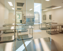 A lab room that is empty except for tables.